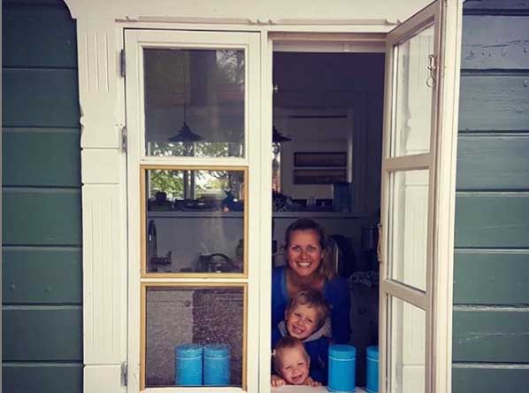 Jessica Boehrs poses for a photo with her kids.